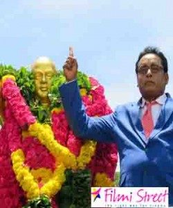 A movie team pays respect to BR Ambedkar Statue