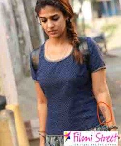Positivity tattoos text in Nayantharas left hand